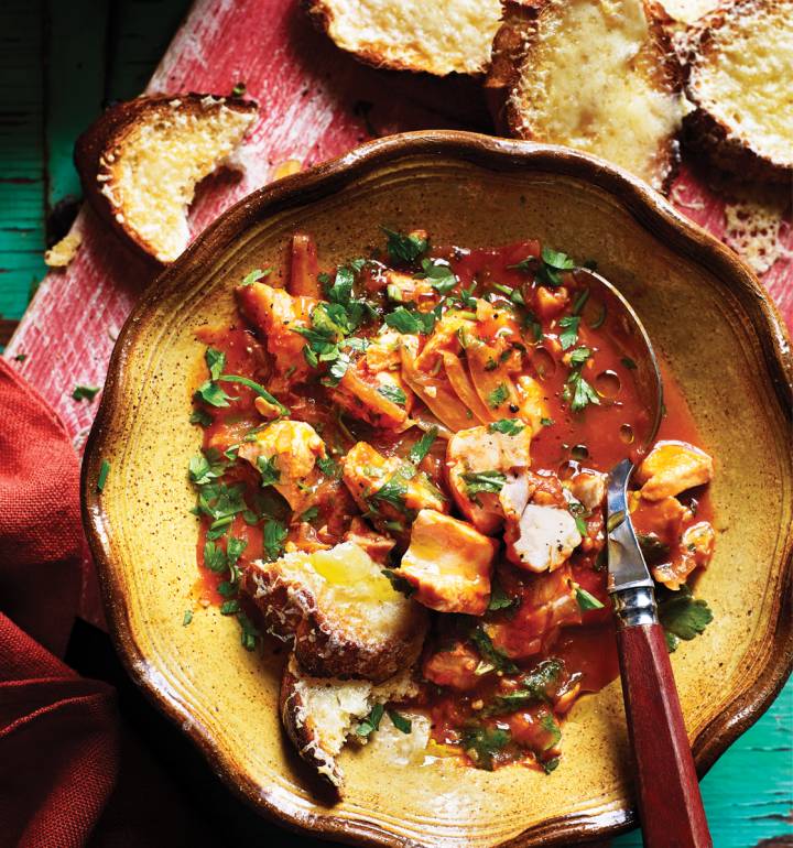 Mediterranean fish stew with cheese toasts