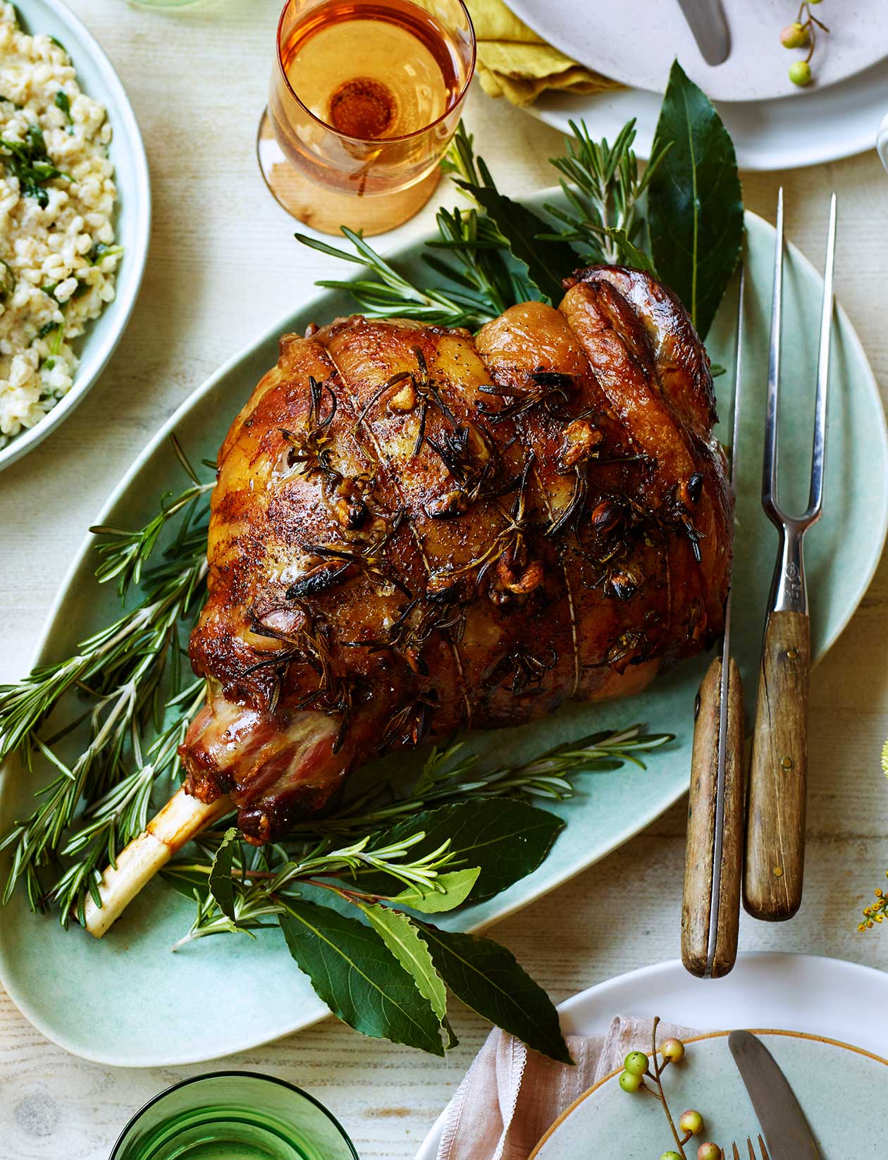 Roast leg of lamb with garlic and rosemary recipe | Sainsbury`s Magazine