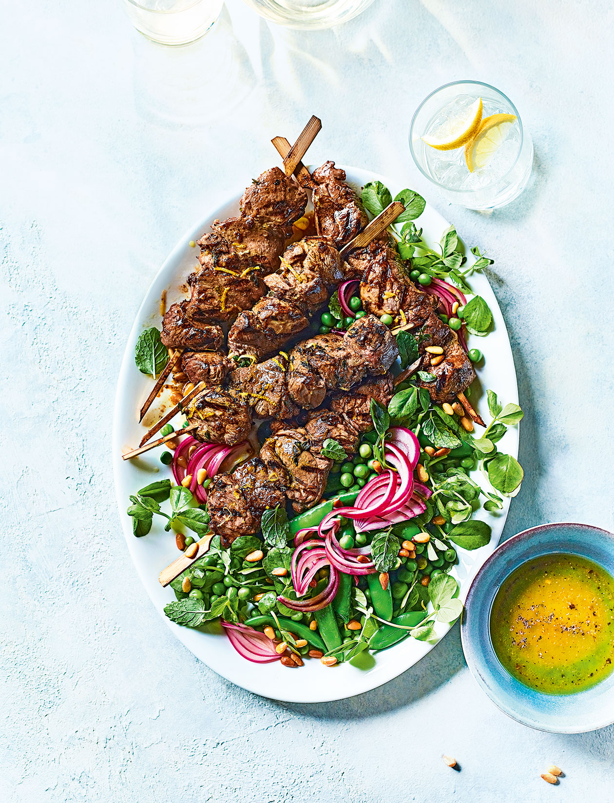 Lamb kebabs with summer pea salad recipe | Sainsbury`s Magazine