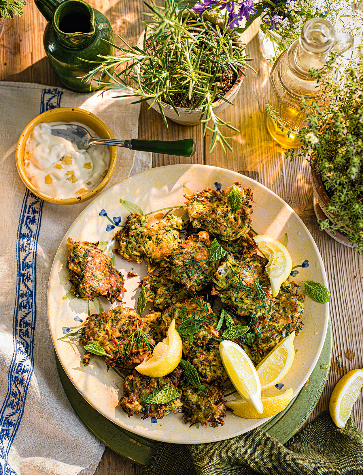 image of Courgette and Feta Fritters, Preserved Lemon, Dill and Mint recipe by Sainsbury’s Magazine