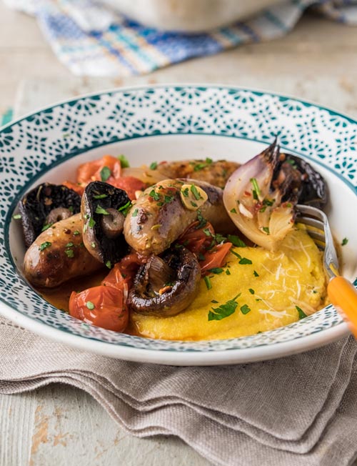 image of Creamy Polenta With Roasted Italian Sausages recipe by Sainsbury’s Magazine