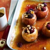 Baked toffee apples with blackberries