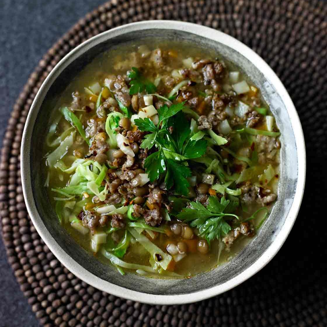 sausage lentil and spring greens soup sainsbury s magazine