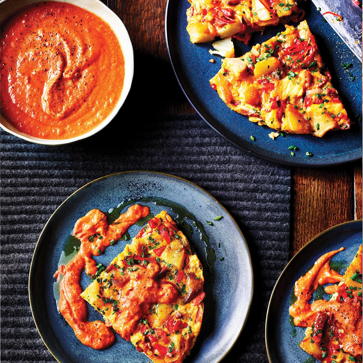 https://www.sainsburysmagazine.co.uk/uploads/media/1800x1800/00/8990-Spanish-omelette-with-tomato-sauce.jpg?v=1-0