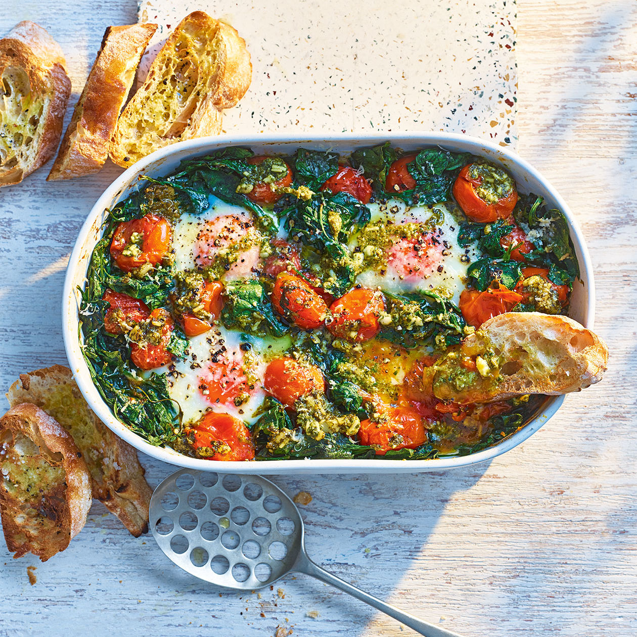 https://www.sainsburysmagazine.co.uk/uploads/media/1800x1800/08/14828-pesto-baked-eggs.jpg?v=1-0