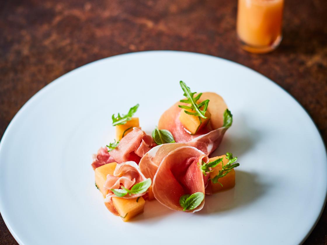 Serrano ham and basil infused melon